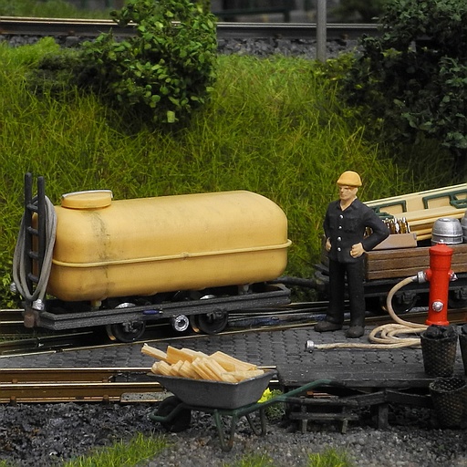 Filling up the tank at the hydrant in front of the engine shed.